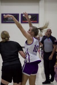 A athlete shooting a shot